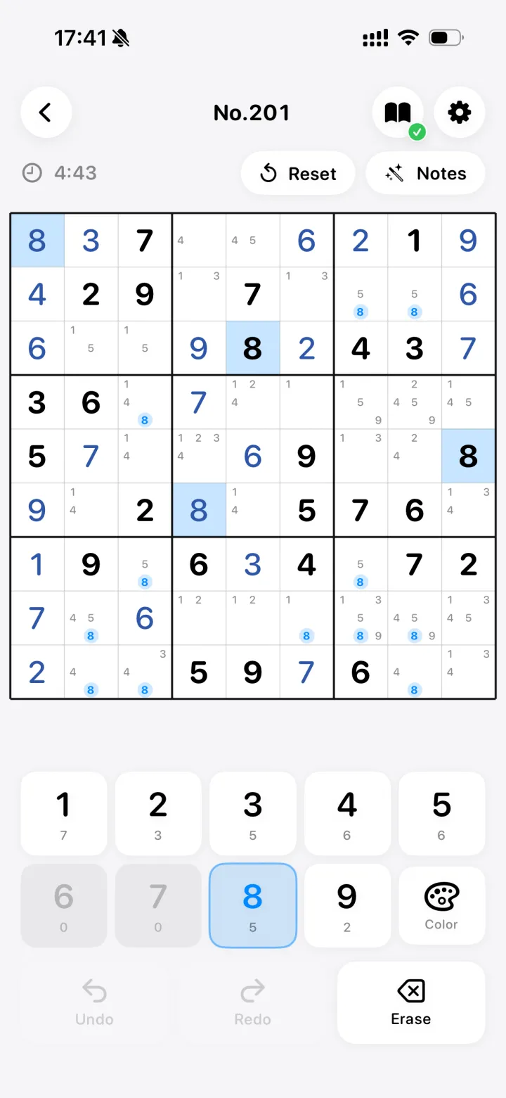 Solving a sudoku, with digits and pencil-mark candidates on the board